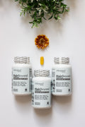 Wellness supplement bottles flat lay